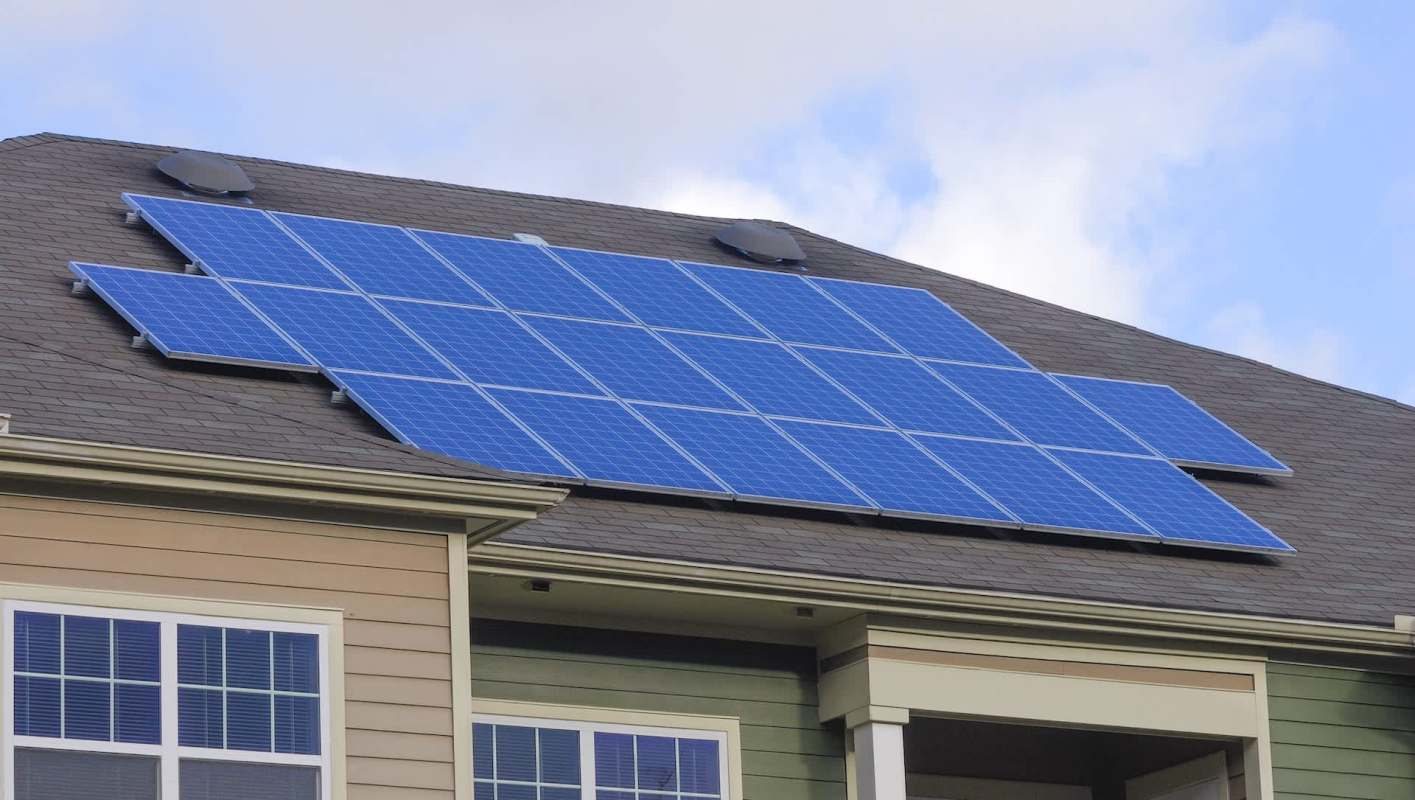 Solar panels integrated neatly across a residential roof